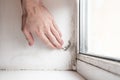 White wall with black mold and fungus. The problem of ventilation, dampness, cold in the apartment Royalty Free Stock Photo