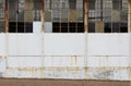 White wall with broken windows Royalty Free Stock Photo