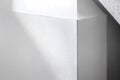 Minimalist White Wall Corner with Subtle Texture and Shadows Royalty Free Stock Photo