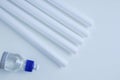 White wall molding transparent glue tube. Home improvement. White background