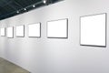 White wall in museum with frames Royalty Free Stock Photo