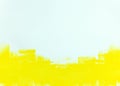 White wall painted in bright yellow with paint roller Royalty Free Stock Photo