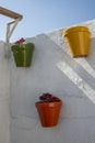 White wall of a terrace with pots hanging Royalty Free Stock Photo