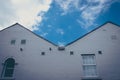 White wall and window in medieval european house, Obidos, Portugal, square image Royalty Free Stock Photo