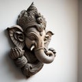 A white walled room with a statue of an Indian mythological God Lord Ganesha as Mural. Ai generated Royalty Free Stock Photo