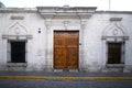White walls and doors of the old streets of the city of Arequipa in Peru. Royalty Free Stock Photo