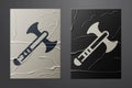 White War axe icon isolated on crumpled paper background. Battle axe, executioner axe. Medieval weapon. Paper art style
