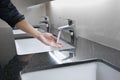 White washbasins and faucet on granite counter Royalty Free Stock Photo