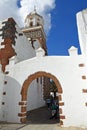 White washed Bell tower and arch Teguise Lanzarote