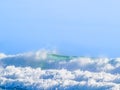 White water of crashing surf waves under blue sky surf background image