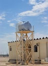 white water tanks on matel stand