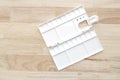 White watercolor palette. Empty watercolor tray isolated on wood background Royalty Free Stock Photo