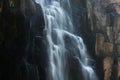 White waterfall and rocks. Royalty Free Stock Photo