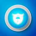 White Waterproof icon isolated on blue background. Shield and umbrella. Water protection sign. Water resistant symbol