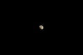 Gibbous moon in dark sky