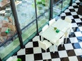 White weave chairs and table in glass house cafe top view