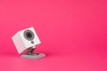 white webcam on red background, object, Internet, technology con Royalty Free Stock Photo