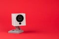 white webcam on red background, object, Internet, technology con Royalty Free Stock Photo