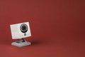 White webcam on red background, object, Internet, technology concept