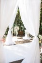 White wedding arch with flowers and white carpet Royalty Free Stock Photo