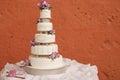 White wedding cake decorated with flowers Royalty Free Stock Photo