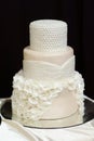 White wedding cake decorated with white pearls Royalty Free Stock Photo