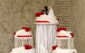 White wedding cake with red roses Royalty Free Stock Photo