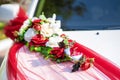 White wedding car decorated with fresh flowers. Wedding decorations Royalty Free Stock Photo
