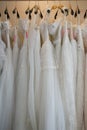 White wedding dresses hanging on racks Royalty Free Stock Photo