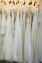 White wedding dresses hanging on racks Royalty Free Stock Photo