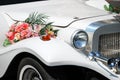 White wedding limousine with flowers Royalty Free Stock Photo