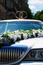 White wedding limousine with flowers Royalty Free Stock Photo