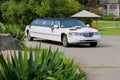 White wedding limousine. Ornated with flowers Royalty Free Stock Photo