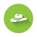 White Western cowboy hat icon isolated with long shadow. Green circle button. Vector Illustration