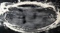 White wheat flour scattered on a black table, inscription frame