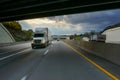 White 18 wheeler semi truck and overpass Royalty Free Stock Photo