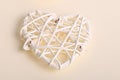 White wicker hearts on a cream background