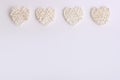 White wicker hearts on a white background