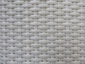 White wicker woven texture. Close up white bamboo mat as striped background. Oriental artificial rattan pattern Royalty Free Stock Photo