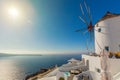 White windmill on Santorini island, travel in Greece Royalty Free Stock Photo