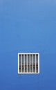 White window, blue wall background Royalty Free Stock Photo