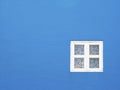 White window, blue wall background Royalty Free Stock Photo