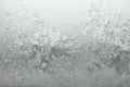 White window glass covered hoarfrost ice pattern texture. Cold nature winter background Royalty Free Stock Photo