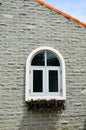 White window on granite brick wall Royalty Free Stock Photo