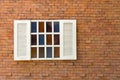 White window with old red brick wall Royalty Free Stock Photo
