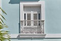 Window with small French balcony in neoclassical building in historic center of Cienfuegos, Cuba. Royalty Free Stock Photo