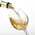 White wine being poured on white background Royalty Free Stock Photo