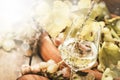 White wine being poured into a glass, vintage wood background, selective focus Royalty Free Stock Photo