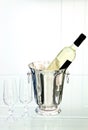 White wine bottle in ice bucket Royalty Free Stock Photo