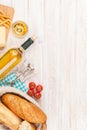 White wine, cheese and bread on white wooden table background Royalty Free Stock Photo